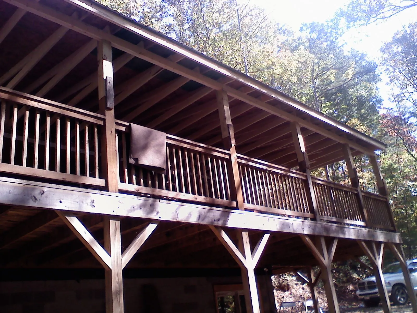 Timber framing under a new elevated porch and deck — Roof Leak Repair in Center Line by Roofing Brothers